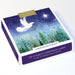 Box of Christmas charity cards with a dove and tree design on a white background
