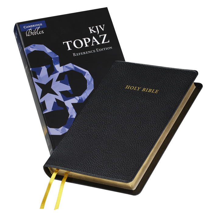 Black Bible with 'HOLY BIBLE' text and matching packaging on a white background