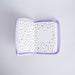 A square zippered pouch with a lavender purple border, shown open to reveal a white interior lined with small black geometric triangle patterns. The center of the lining features a dotted circle and the words 'PRESENTED TO'.