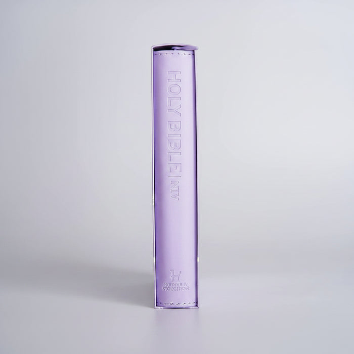 NIV Compact edition Bible. Lavender purple imitation leather Bible case The embossed text 'HOLY BIBLE, NIV.