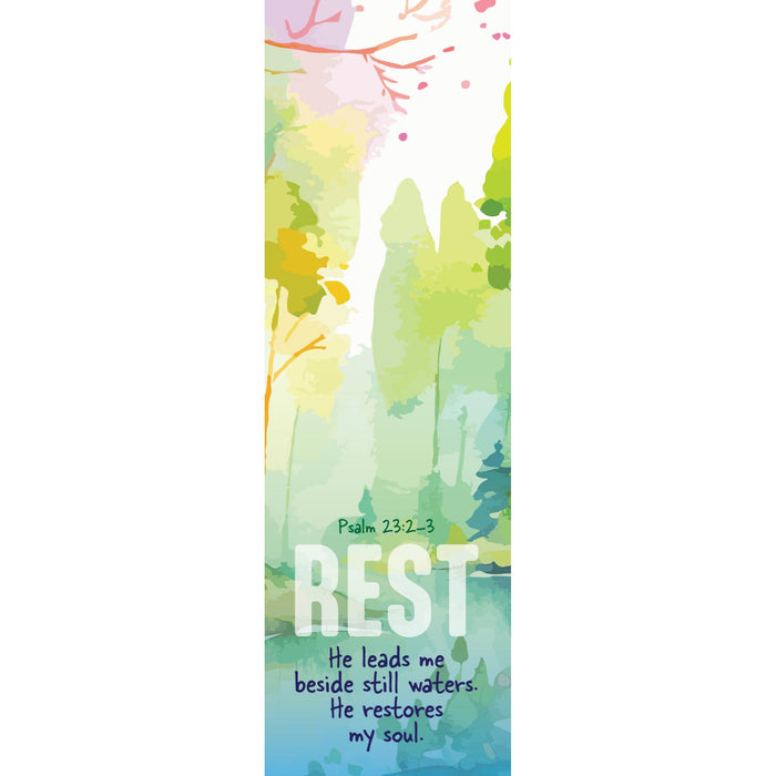 A tall, narrow decorative card or print featuring a watercolor forest scene in soft green, yellow, blue, and pink tones. Large white text reads “REST,” with smaller scripture text above and a quote below in dark blue.