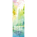 A tall, narrow decorative card or print featuring a watercolor forest scene in soft green, yellow, blue, and pink tones. Large white text reads “REST,” with smaller scripture text above and a quote below in dark blue.