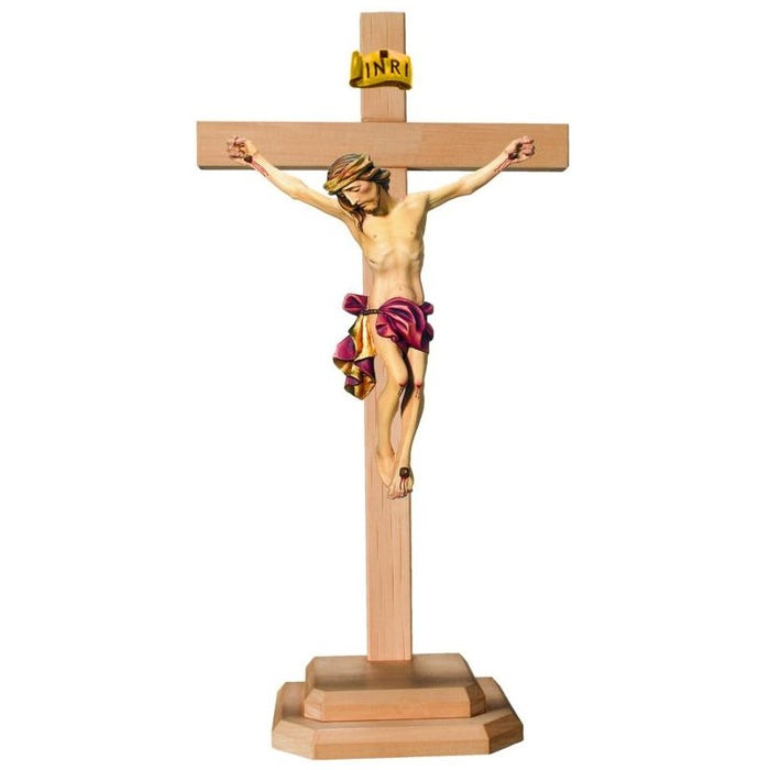 Standing Carved Crucifix, Body of Christ with Red Loincloth Set on a Light Coloured Cross, Available In 8 Sizes