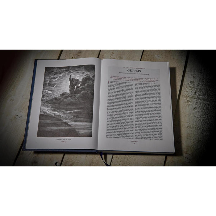 An open book showing a black-and-white illustration of a stormy seascape on the left page and a text page titled GENESIS on the right, placed on a rustic wooden surface.