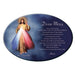 Oval-shaped plaque with image of a religious figure and 'Divine Mercy' prayer on a blue background