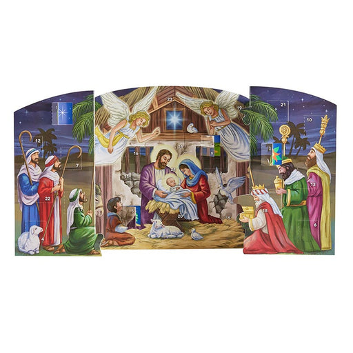 A Christmas nativity scene advent calendar with multiple illustrated panels showing angels, Mary, Joseph, baby Jesus in a manger, wise men, and stars, photographed against a plain white background.