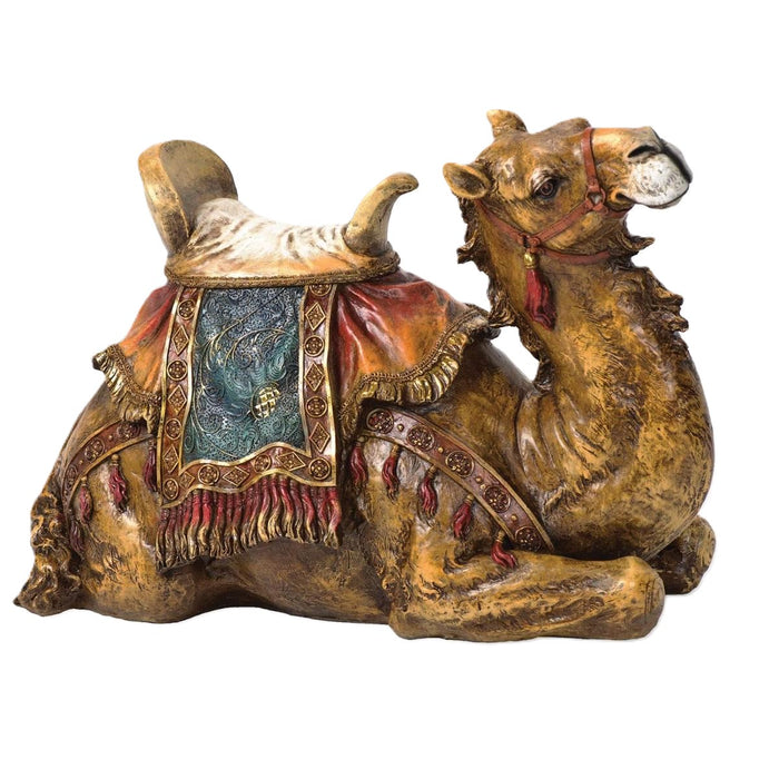 Decorative camel figurine with intricate details on a white background