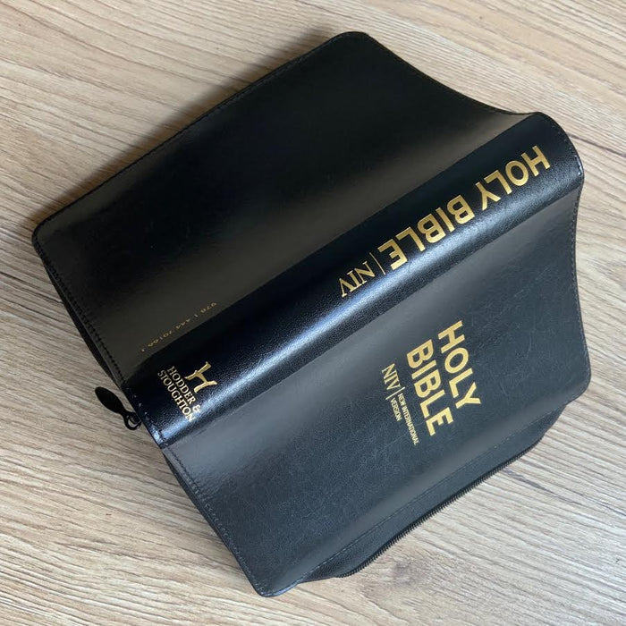 NIV Pocket Black Bonded Leather Bible with Zip - British Text Revised and Updated Edition