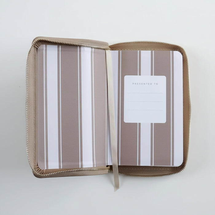An open zippered presentation folder with a taupe and white striped pattern, featuring a blank white 'PRESENTED TO' card on the right side.
