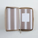 An open zippered presentation folder with a taupe and white striped pattern, featuring a blank white 'PRESENTED TO' card on the right side.