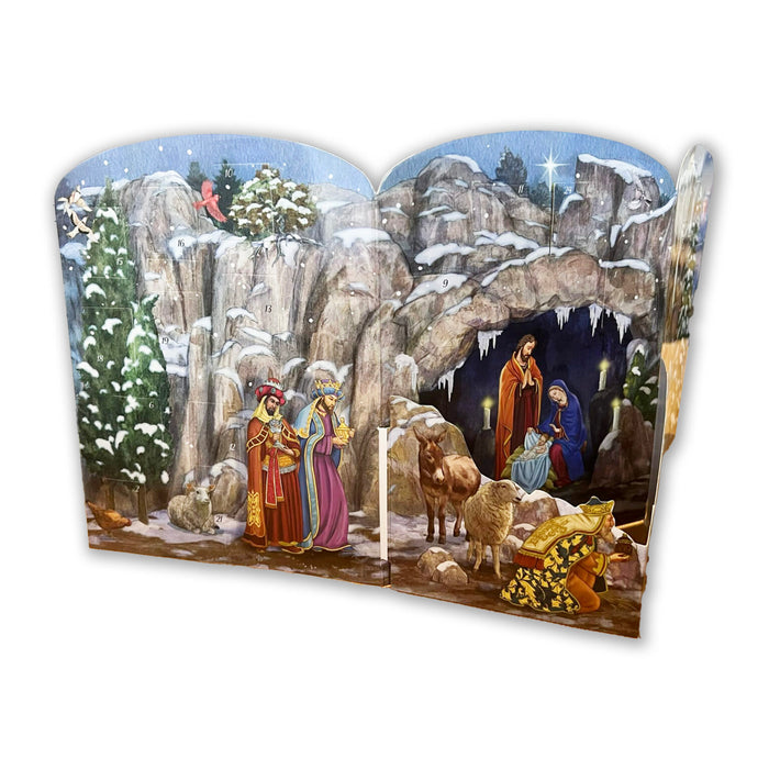 A double-sided Christmas nativity scene wall panel or backdrop, featuring a snowy mountain cave with the Holy Family, wise men, shepherds, and angels, shown against a plain white background.