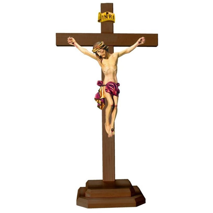 Standing Carved Crucifix, Body of Christ with Red Loincloth Set on a Dark Coloured Cross, Available In 8 Sizes