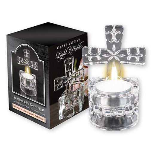 A glass tea light candle holder with a cross design, including a votive candle tea light, packaged in a black box with a clear display window.